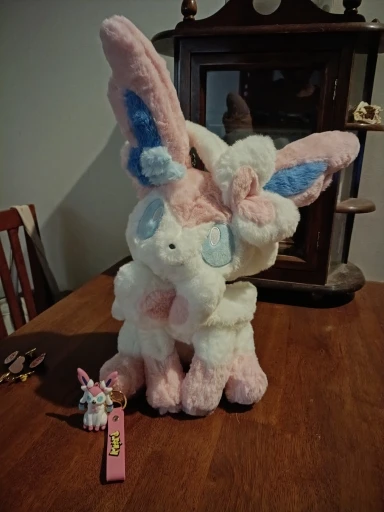 Sitting Pose Sylveon Plush Toy Huggable Soft Fluffy Stuffed Anime Doll Japanese Style Throw Pillow Sofa Bed Home Decor Gifts photo review