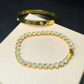 簡約風格的兩件式手鐲,包括一個圓形手鐲和一條單排鋯石鏈手鍊。生日禮物。 8 最佳銷售 禮物籃 - №5