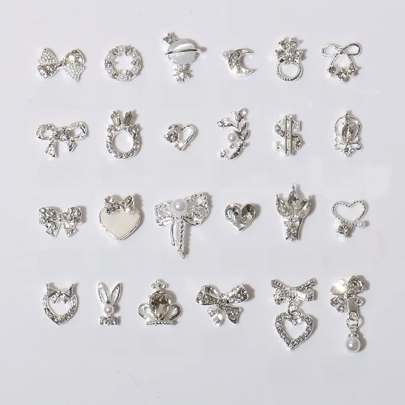 Mix 10/15 sztuk w kształcie dżetów zawieszka do paznokci srebrna kokarda paznokci zwisają luksusowe metalowe serce 3D zdobienie paznokci dekoracje Manicu — zdjęcie 2
