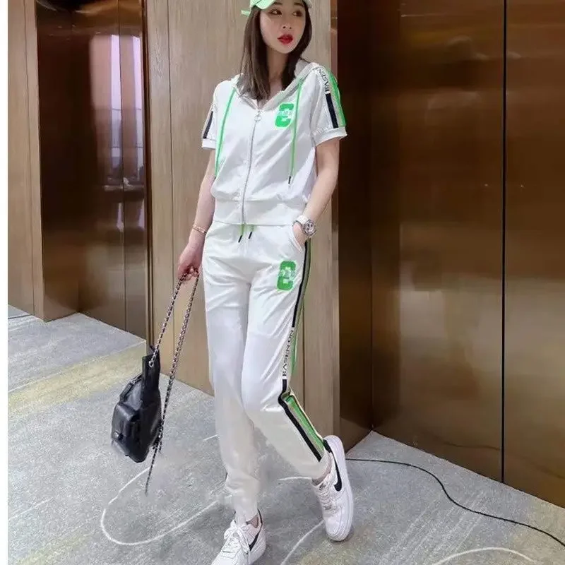 Moda damska Garnitur Wiosna Lato Nowy Zamek błyskawiczny Płaszcz z krótkim rękawem Casual Crop Tops Spodnie 2-częściowy zestaw dla kobiet Odzież — zdjęcie 2