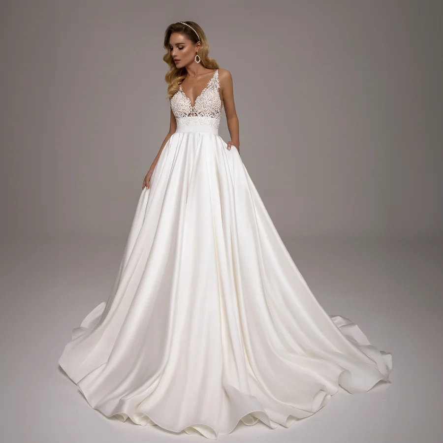 

Delicate Satin Wedding Dress Features Applique Bodice And Spaghetti Straps Luxurious Bridal Gown with Pockets And Court Train