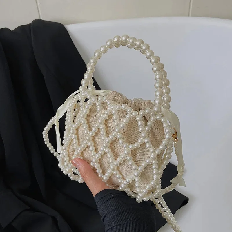2022 nowy niszowy, wysokiej jakości plażowy z wcięciem, tkany perłowy materiał akrylowy modne codzienne torby Crossbody dla kobiet — zdjęcie 2