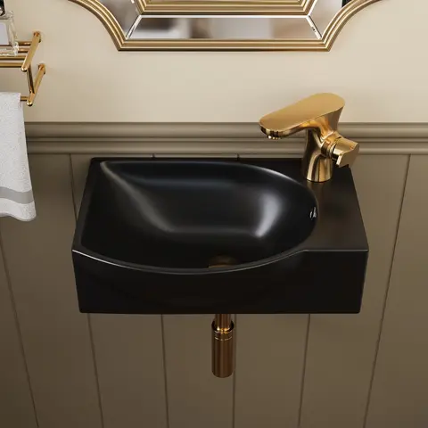 The modern wall-mounted bathroom sink is made of ceramic material and is suitable for home bathrooms. This sink is easy to install and comes in a black design. (Without faucet)