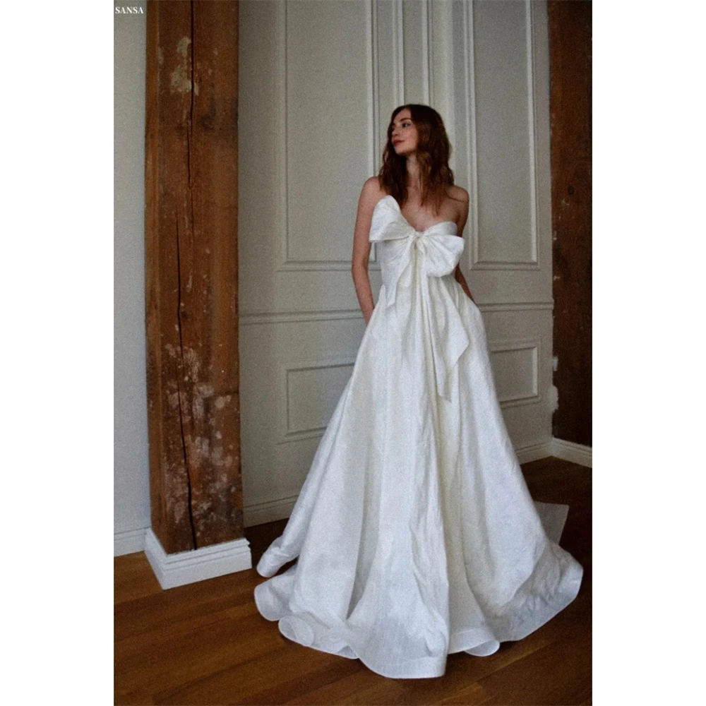 Sansa Aangepaste Witte Sweetheart Hals A-lijn Elegante Strik Galajurk Mouwloos Vestidos De Noche Vloerlengte Formele Avond