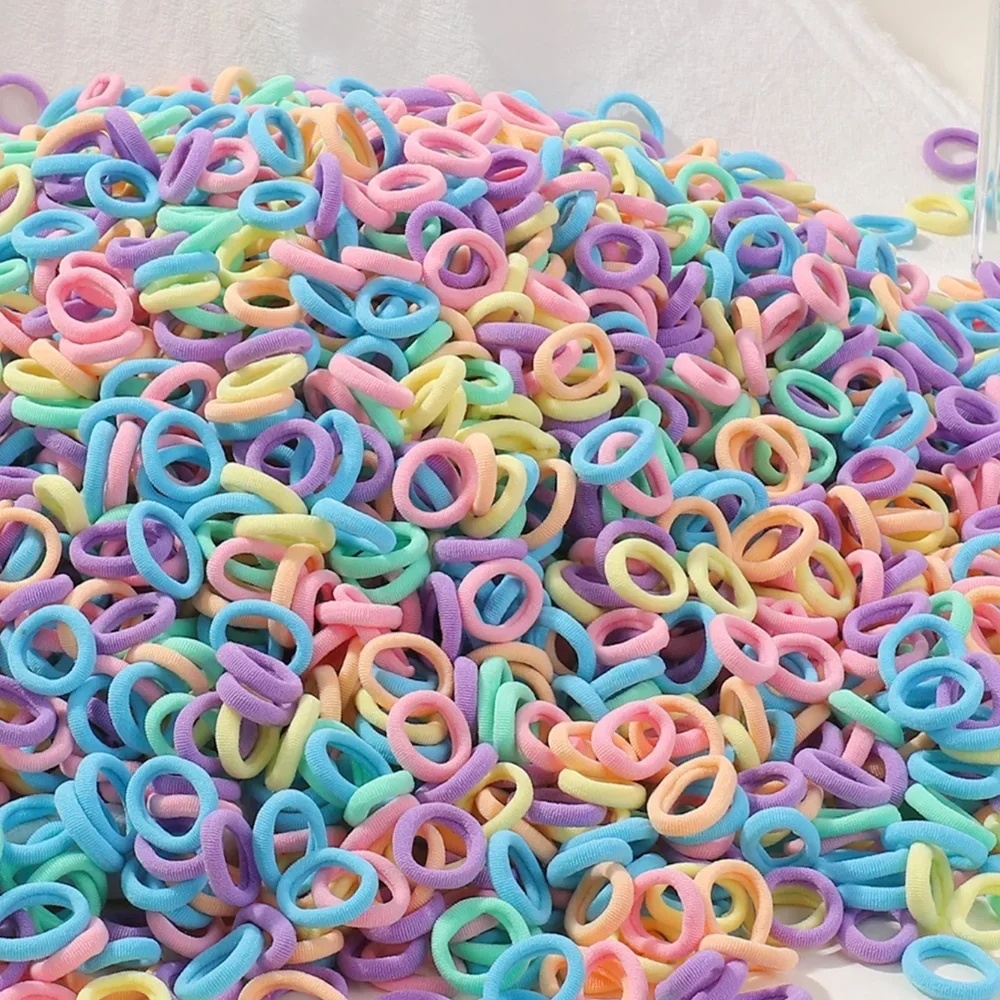 Bandes de cheveux élastiques pour enfants, 50 pièces, accessoires de cheveux pour filles, Mini attaches de cheveux en Nylon colorées, support queue de cheval pour enfants, corde de tête Scrunchie