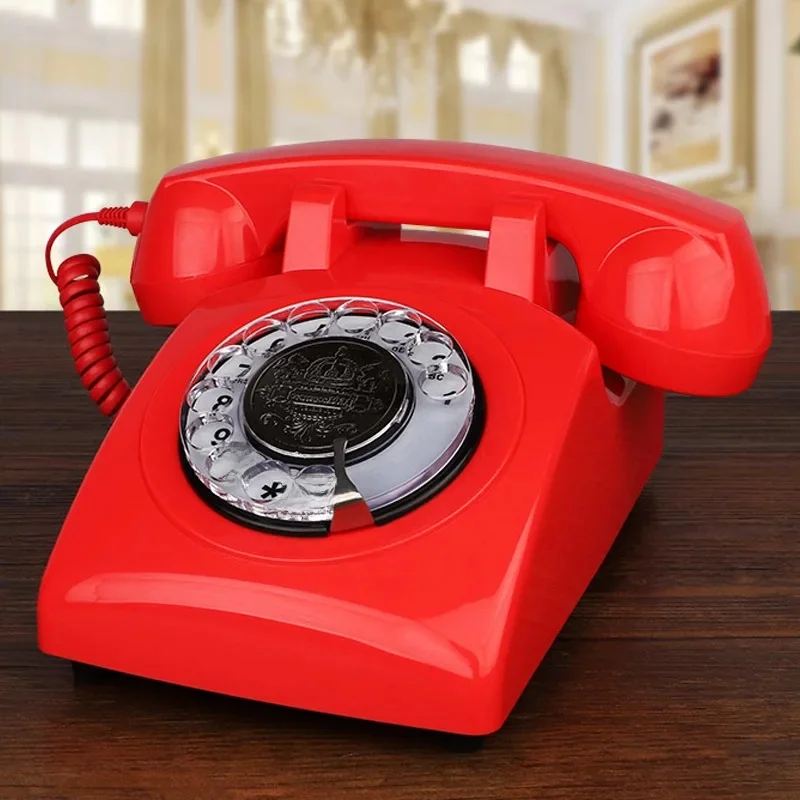 Téléphone filaire rouge, téléphones de bureau à cadran rotatif classique, téléphone vintage antique du téléphone de la vieille mode des années 1930