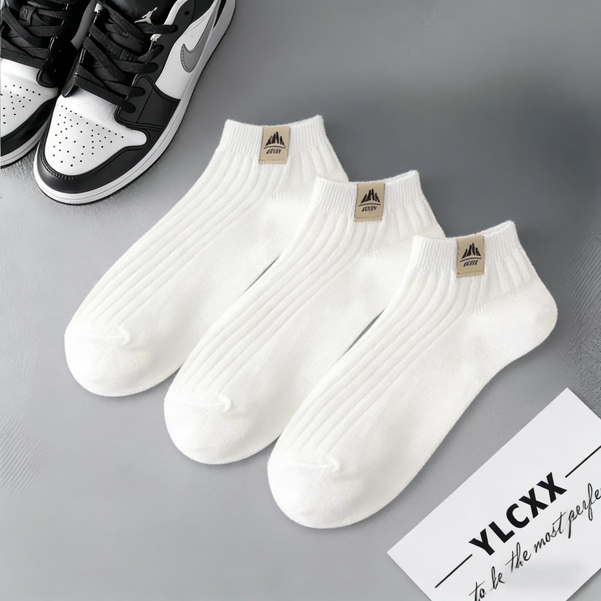 

"5-Pack Breathable Cotton Socks - White Ribbed Texture, Mountain Emblem Label, Cushioned Sole for All-Day Comfort with Casual Sh