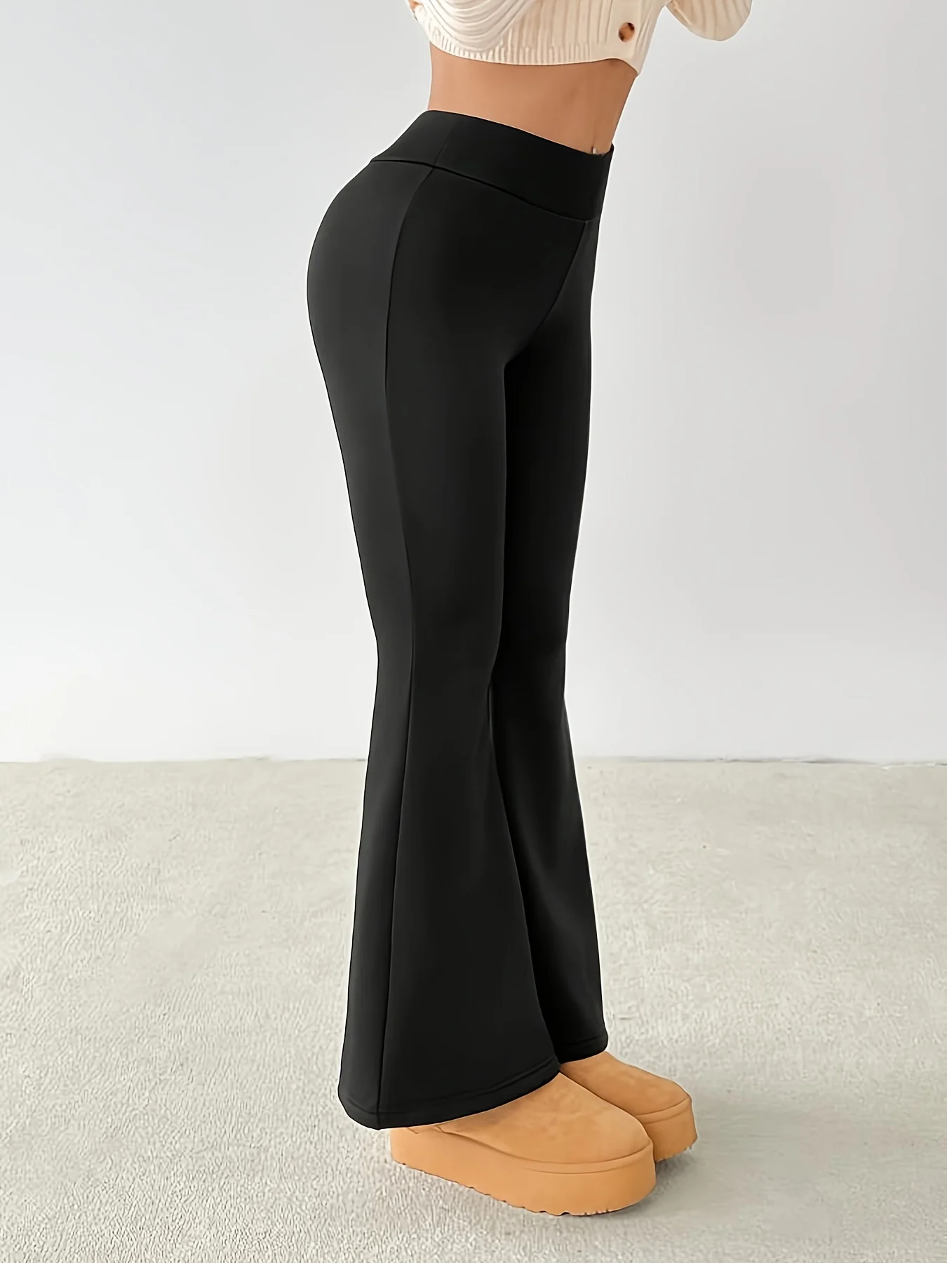 Pantalones de invierno para mujer, color negro puro, cálidos, con parte inferior acampanada, elásticos, cálidos y cómodos, nuevo estilo de moda 2025