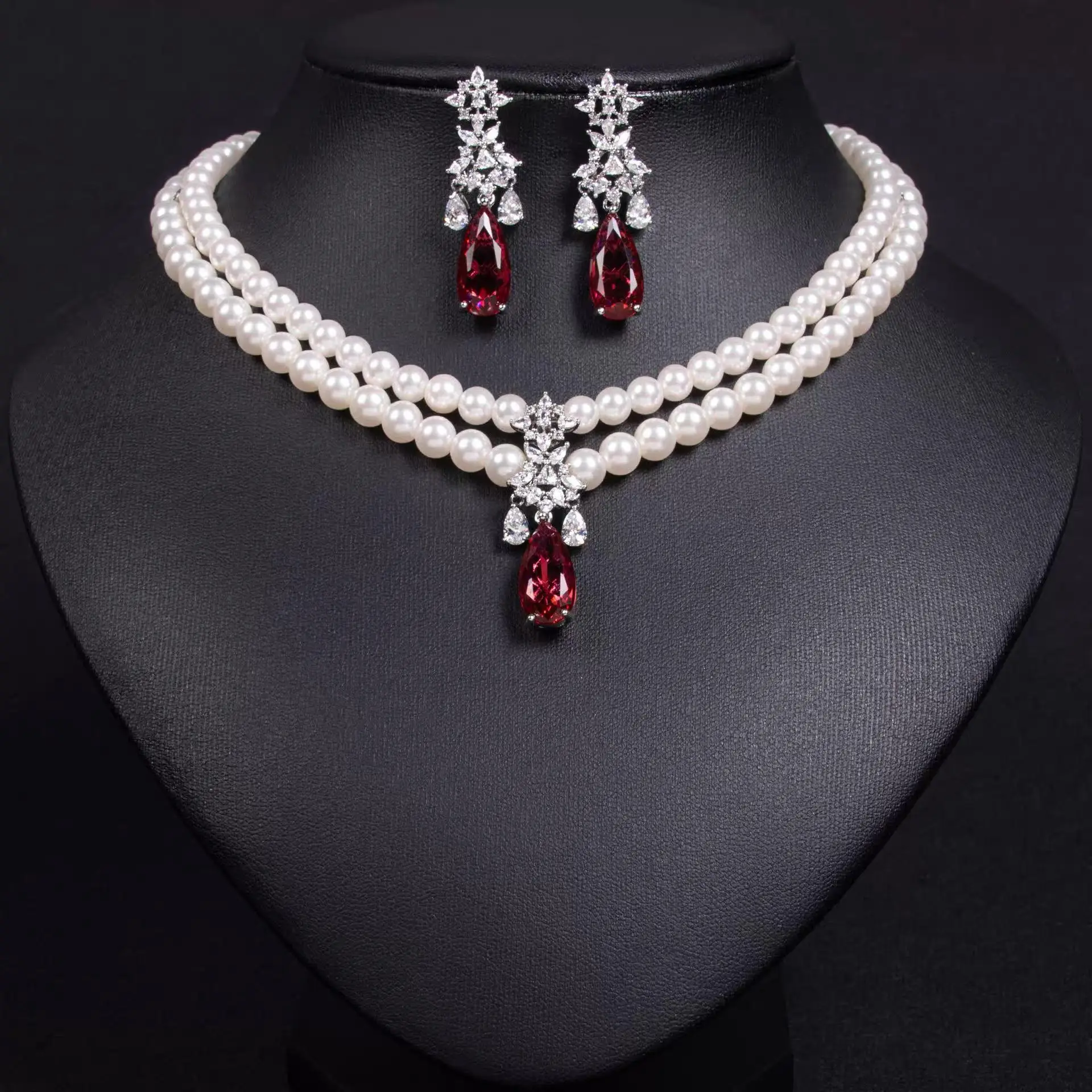 

Opulent Pearl & Crystal Drop Earrings