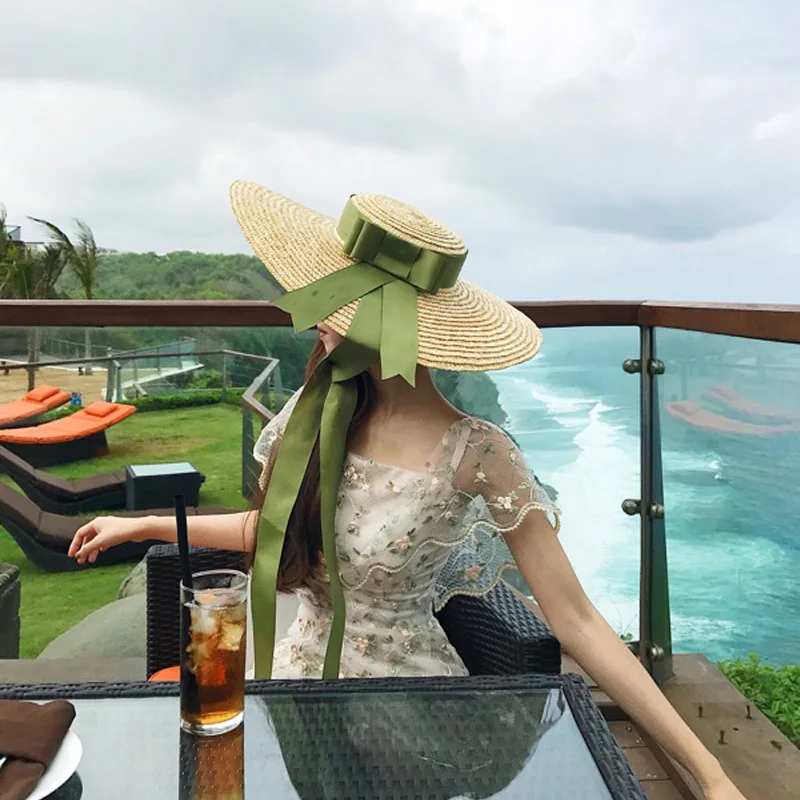 

Женская модная широкополая соломенная шляпа с бантом и лентой, летняя, повседневная, для отдыха на природе, для защиты от солнца, пляжная.