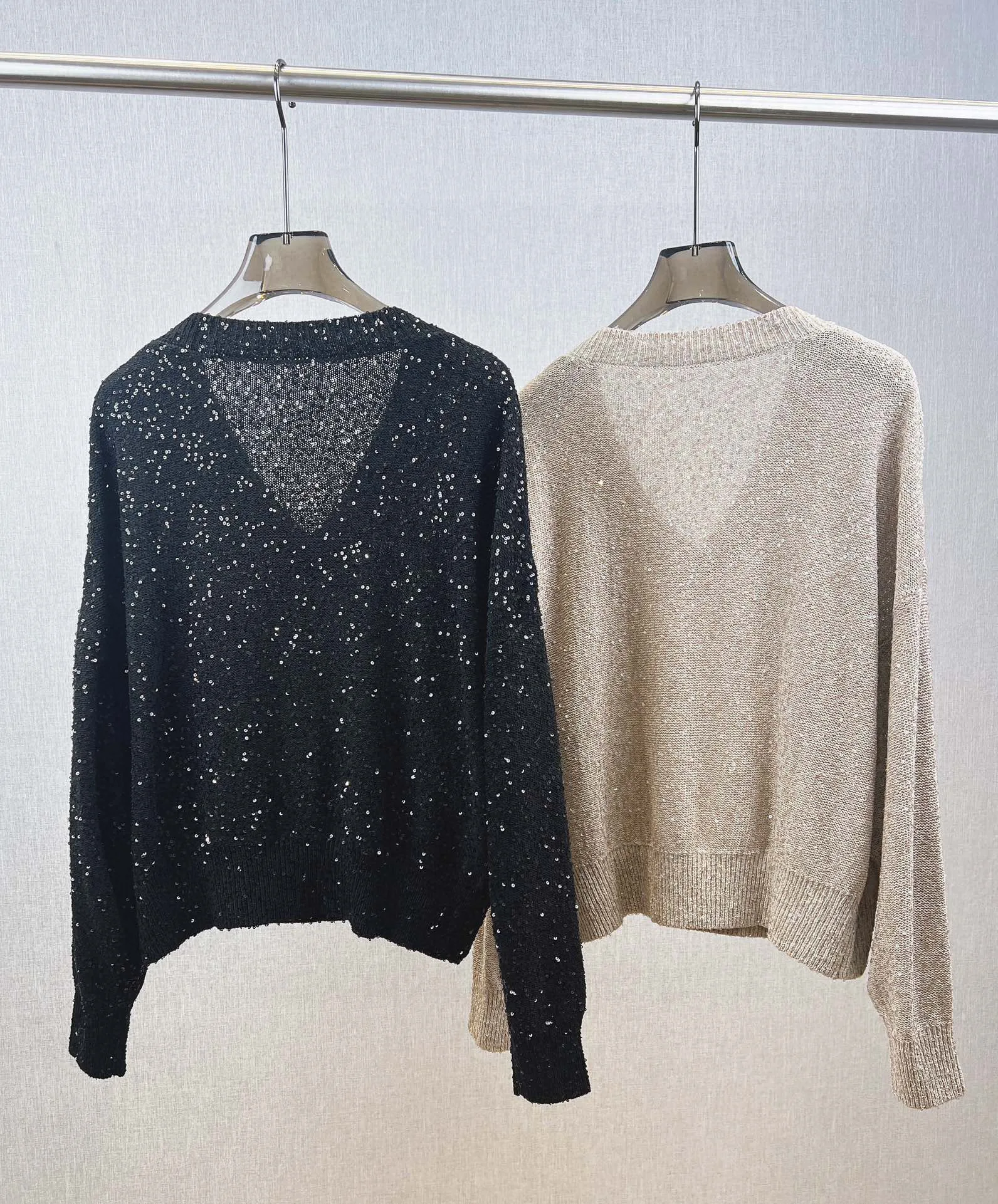 Elegant classic sequined shiny cashmere-linen sweater with long sleeves