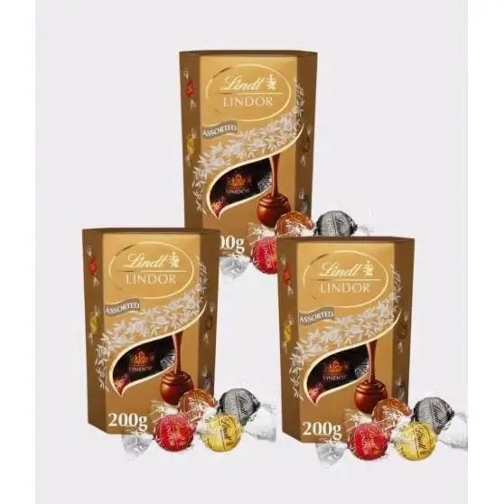 Lindt bombones LINDOR SURTIDO CORNET incluye bombones chocolate negro al 70% de cacao, chocolate con leche, chocolate negro, delicioso bombón con interior de chocolate cremoso, 600 grs -  Pack de 3