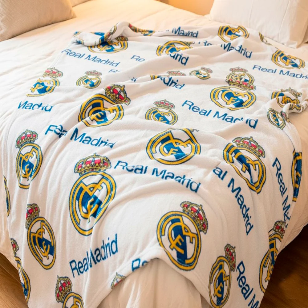 Real Madrid CF - Manta de Coralina 150 x 95cm Real Madrid - Blanca o Azul Licencia Oficial