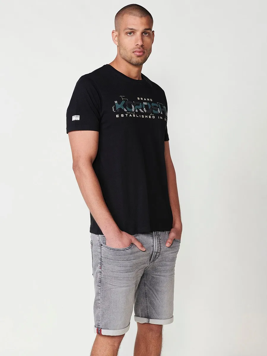 Koroshi Camiseta de Manga Corta de Algodón con Letras Koröshi y Detalle en Manga en Negro para Hombre – 100% Algodón