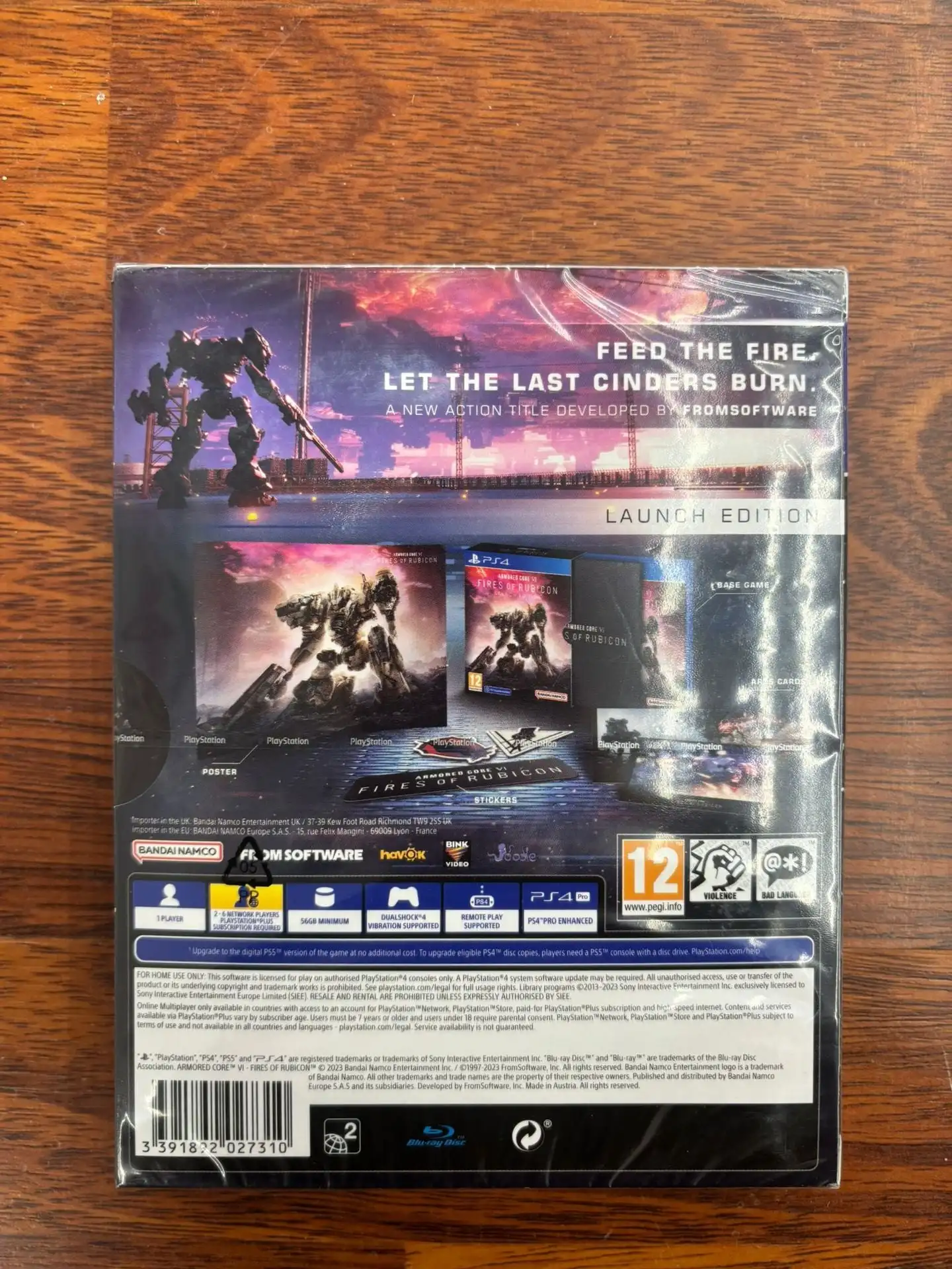 Armored Core VI Fires Of Rubicon Launch Edition for PS4/PS5, includes base game, 3 art cards, 3 exclusive stickers, and a poster, delivering an adrenaline-pumping mech combat experience with dynamic maneuverability in immersive 3D environments.