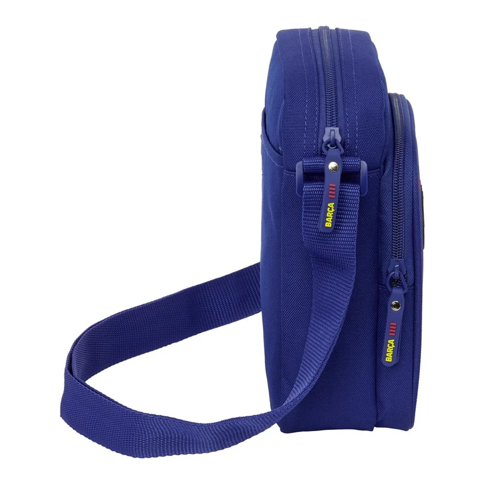F.C. Barcelona Small Sling Bag 1st Equip. 25/26 16x22x6 cm (Safta) for kids, made of durable polyester, features an adjustable strap and secure zipper, perfect for school or outings.