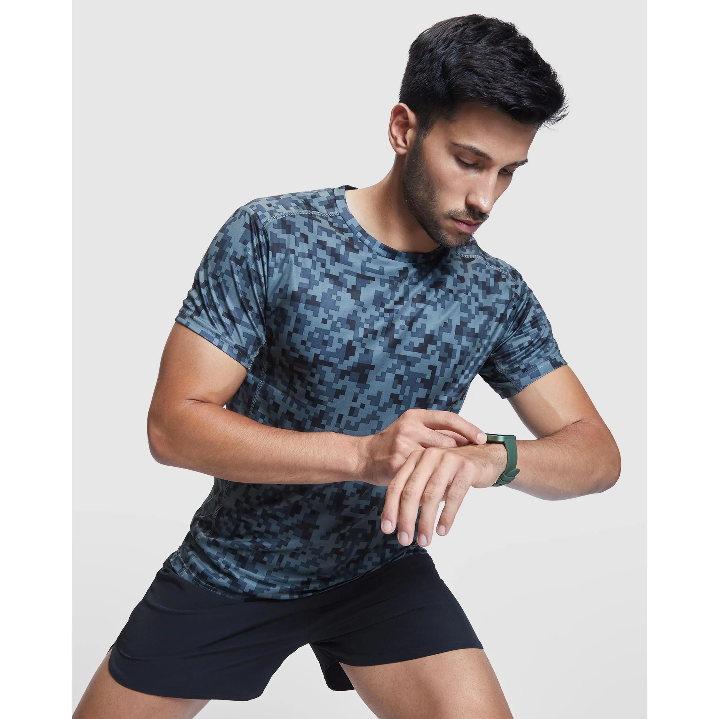 ROLY - ASSEN camiseta técnica de manga corta estampada pixelado de tejido suave, ligero y transpirable, fácil secado