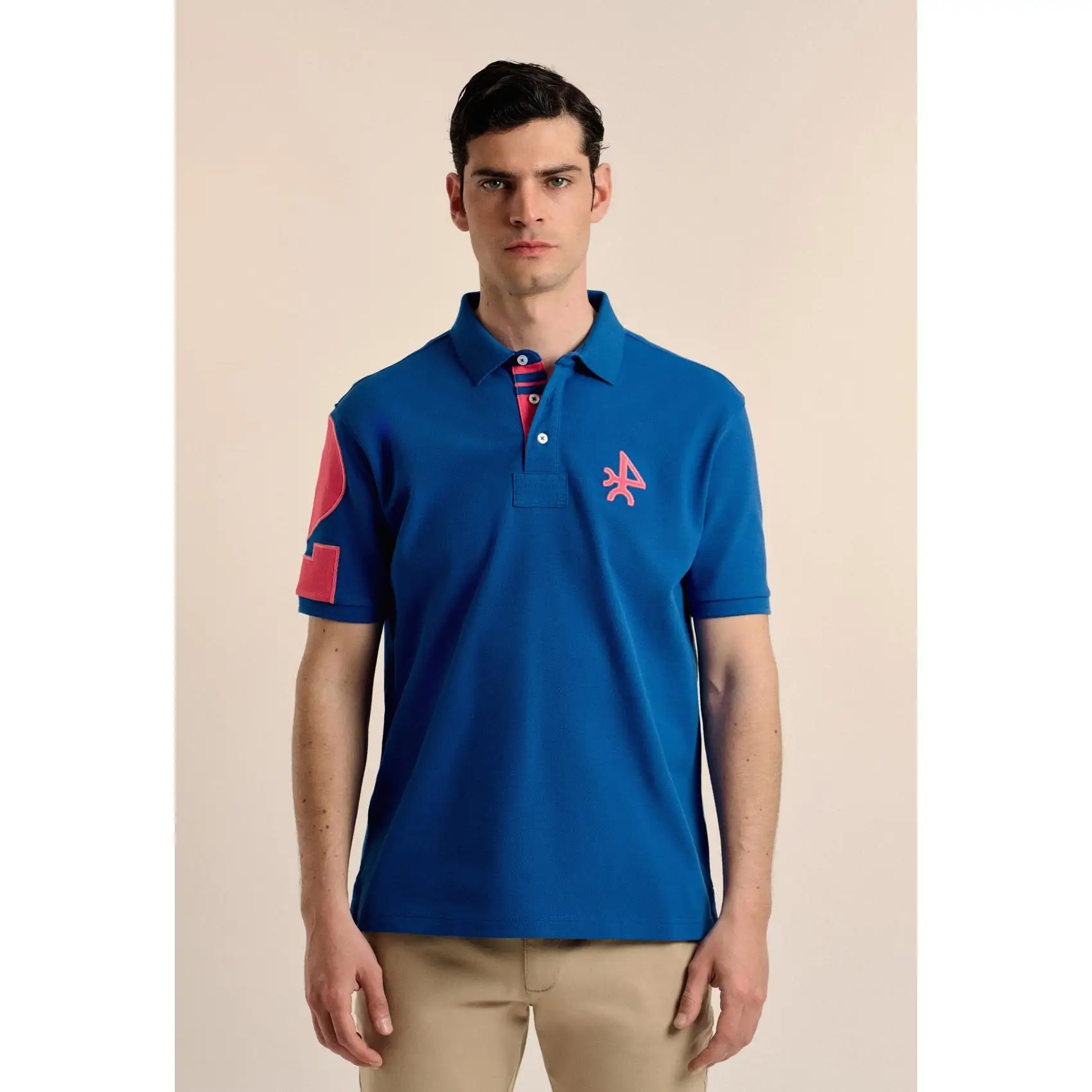 Polo Valecuatro modelo número azul