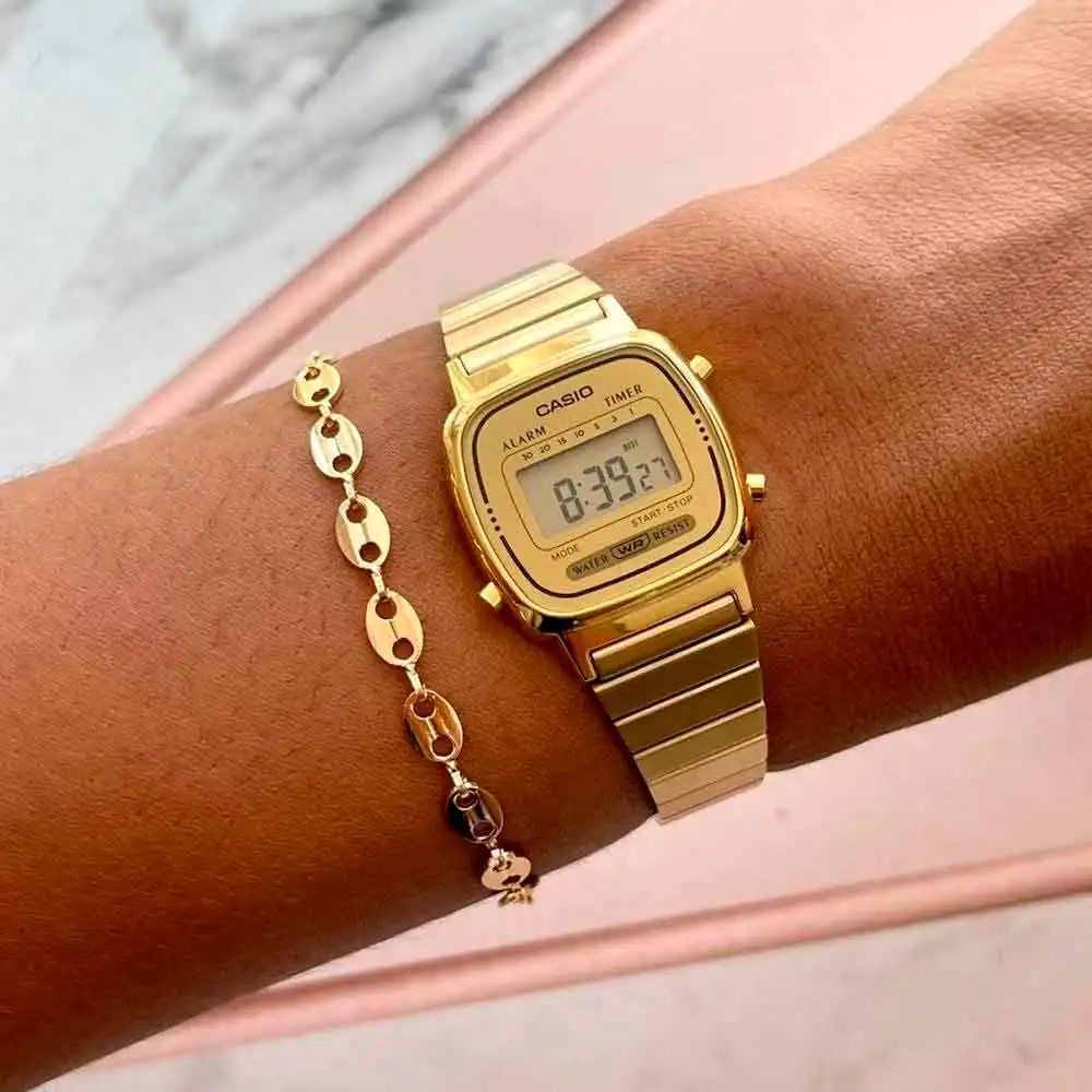 Casio la670wega-9ef digital watch with calendar for women gold color.