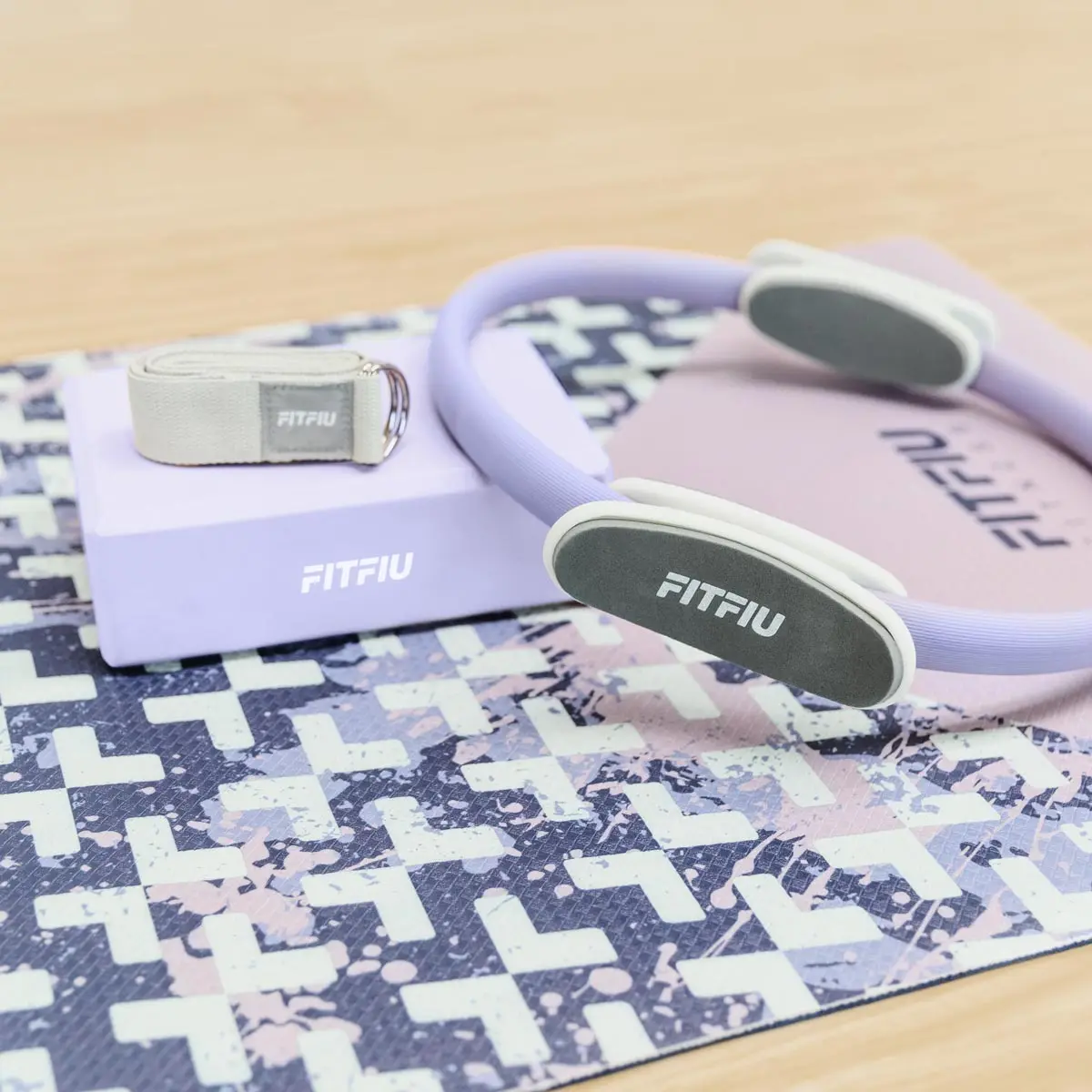 FITFIU Fitness KITWELL-400 - 4 Piece Yoga and Pilates Accessory Set with Mat, Block, Ring, and Strap in Purple, ideal for enhancing flexibility and reducing stress while practicing yoga or meditation.