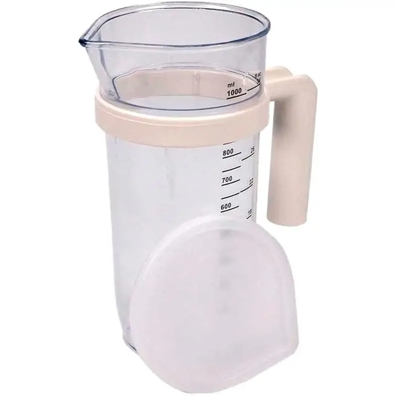 ANAKEL HOME Jarra Medidora 1 Litro con Tapa de Silicona y Asa Desmontable – Vaso Medidor Transparente de Plástico Resistente