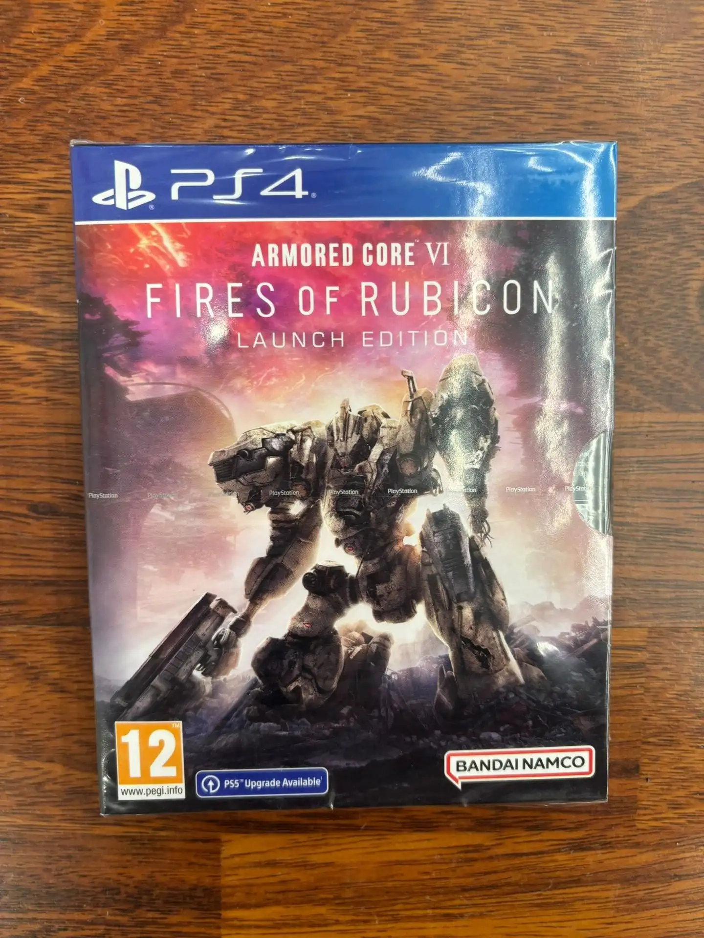 Armored Core VI Fires Of Rubicon Launch Edition for PS4/PS5, includes base game, 3 art cards, 3 exclusive stickers, and a poster, delivering an adrenaline-pumping mech combat experience with dynamic maneuverability in immersive 3D environments.