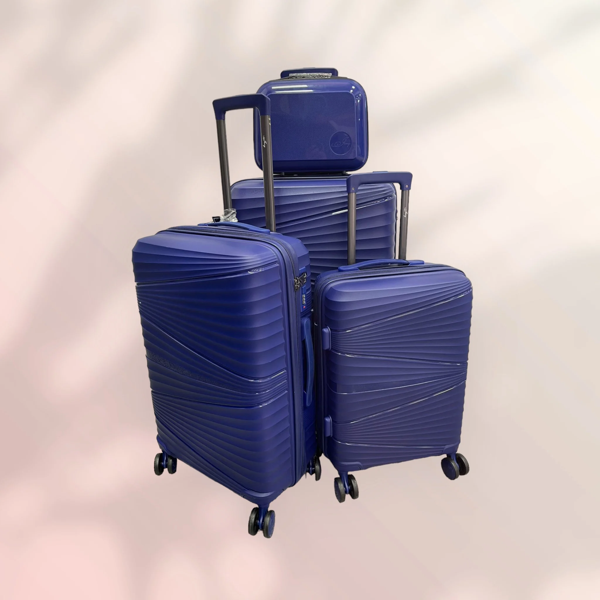 4 PCs set of rigid blue suitcases. Cabin Suitcase, medium suitcase, large suitcase and toiletry bag. Eco Friendly 4 wheel double wheel ABS travel luggage Set 04-04 combination lock