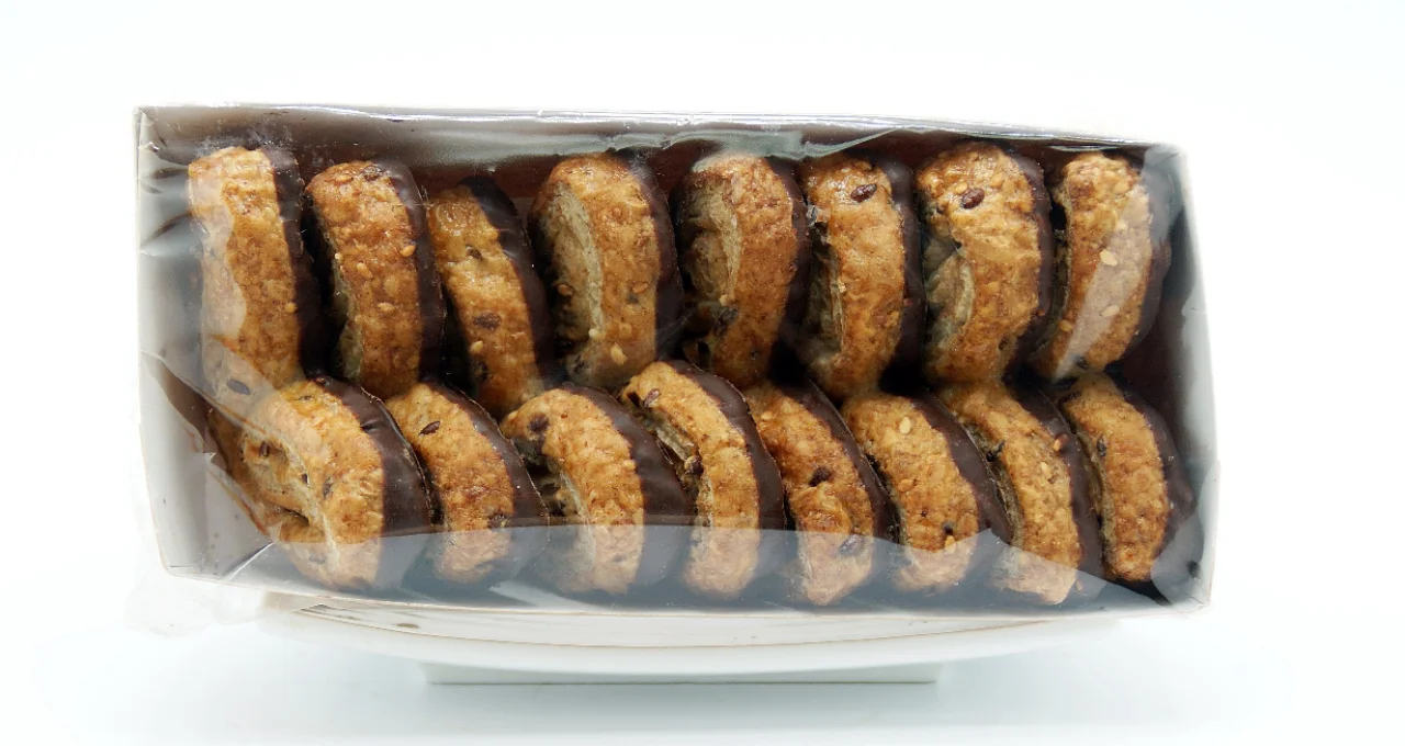 Whole palm tree with sesame and linen medium bath with chocolate coverage without added sugars. Bulk 2 kg - healthy and delicious option. don ramon's oven.