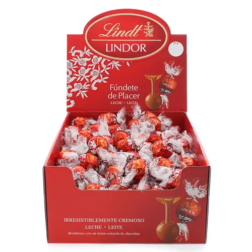 Lindt Lindor a Granel - Cajas de 500g o 2 Kg - Lindor white, Lindor Negro, Leche, Pistacho, Avellana, Caramelo...Bombones esféricos de chocolate blanco con un exterior ligeramente crujiente y un relleno cremoso.