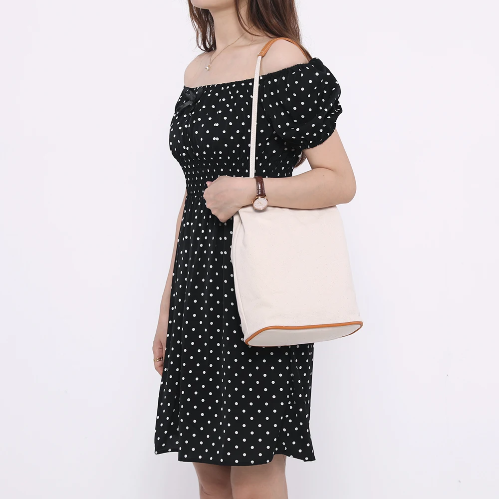 White canvas bag female shoulder art small fresh bucket shoulder bag simple cloth bag 2024 new