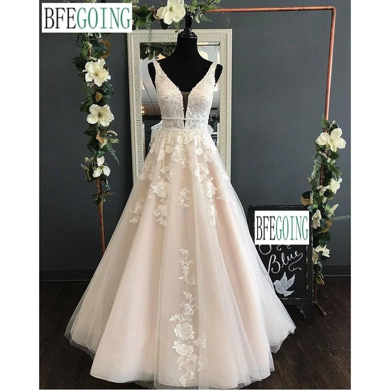 Rendas de luxo beading tule organza v-neck sem mangas a linha vestidos de casamento capela trem vestidos de noiva feitos sob encomenda