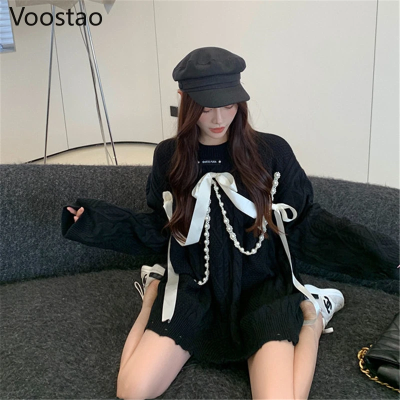 Autunno inverno dolce coreano perle sciolte catena fiocco buco lavorato a maglia Pullover donna elegante Chic o-collo maglione capispalla ragazze top