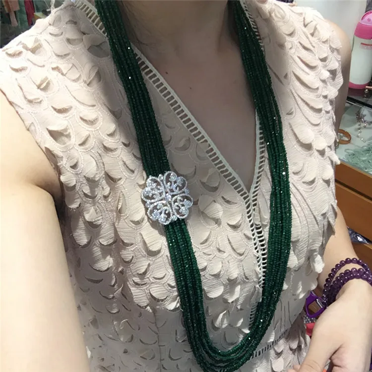 

Long multi-green jade crystal sweater chain flow European and American fashion pure silver micro-set zircon