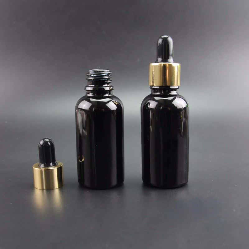 

30pcs/Lot Promotion 30ml Essential Oil Bottle Black Glass Dropper Container Women Cosmetic Empty Jar Refillable 1oz Box