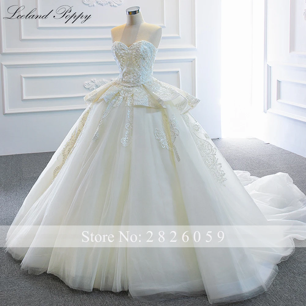 IJsland Poppy op maat gemaakte strapless baljurk kanten trouwjurken mouwloze kralen vloerlengte gelaagde bruidsjurken