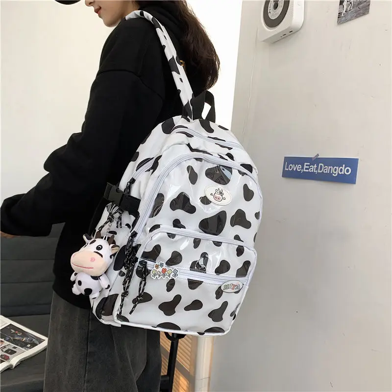 Mochila escolar bonita para niña, morral con estampado de vaca, para adolescentes