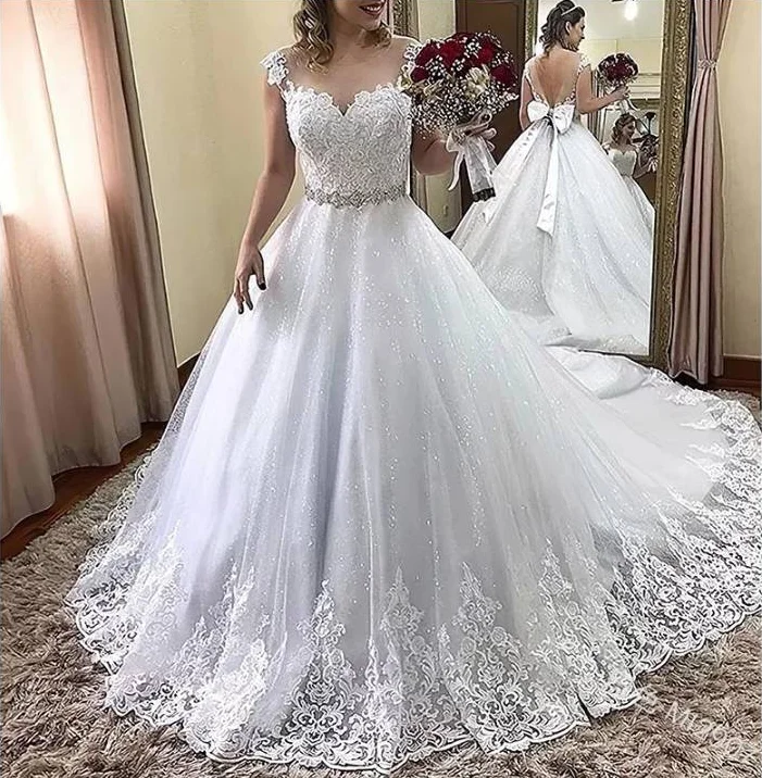 

Puffy Wedding Dresses Ball Gown Cap Sleeves Tulle Appliques Beaded Dubai Arabic Wedding Gown Bridal Dress Vestido De Noiva