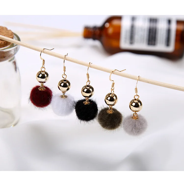 Korean version of the new earrings cute sweet metal ball tassels autumn and winter long paragraph pompom fashion girls jewelry