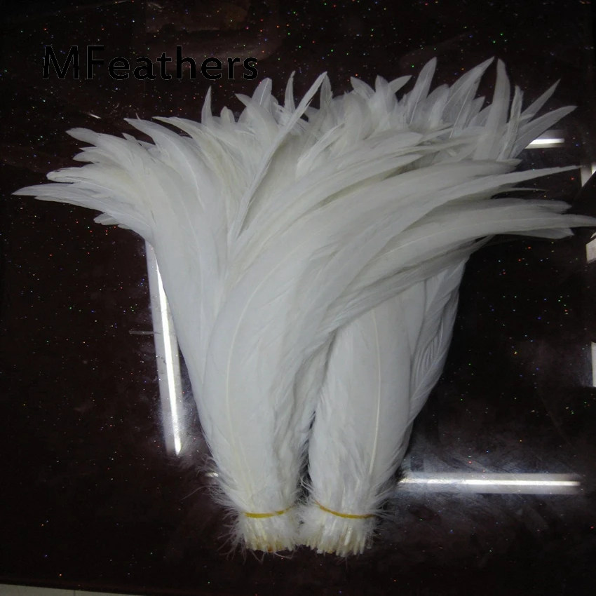 

Wholesale 100pcs/lot Pure White Rooster Coque Tail Feather For Craft making wedding carnival chirstmas Decoration Chicken plumes