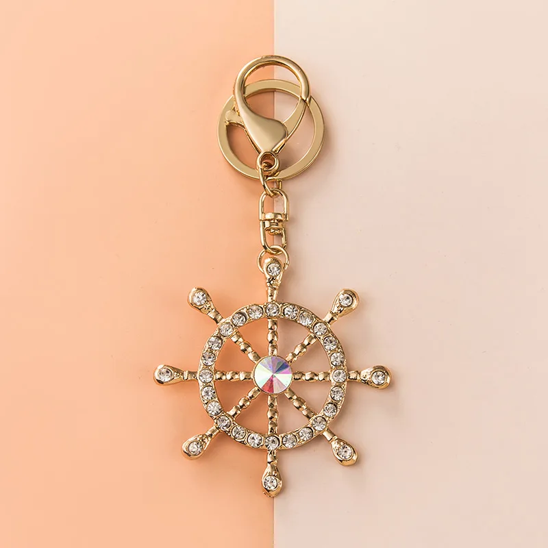 Porte-clés gouvernail en métal incrusté de strass, pendentif créatif en cristal, sac de voiture, bijoux, lanière, accessoire, charme, cadeau pour fille