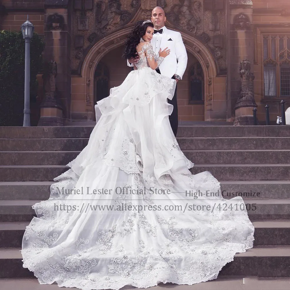 Lujosos vestidos de novia de manga larga de tul Nude, apliques plateados de cuello alto, tren desmontable, sirena, diamantes de imitación