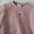 body de color rosa