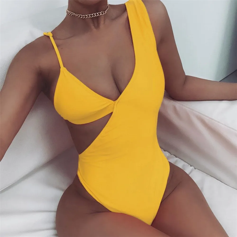 BKLD Backless Della Tuta Delle Donne Senza Maniche Solid 2020 Della Spiaggia di Estate Della Cinghia di Spaghetti Hollow Out Tuta Con Scollo A V Body Slim Tuta Del Pagliaccetto