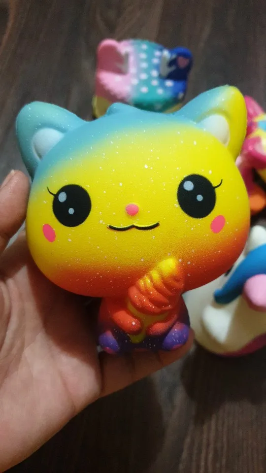 Yeni sarı dondurma kedi Kitty Squishy yavaş yükselen sevimli Jumbo kayış yumuşak Squeeze kokulu ekmek kek oyuncak hediye çocuk eğlenceli