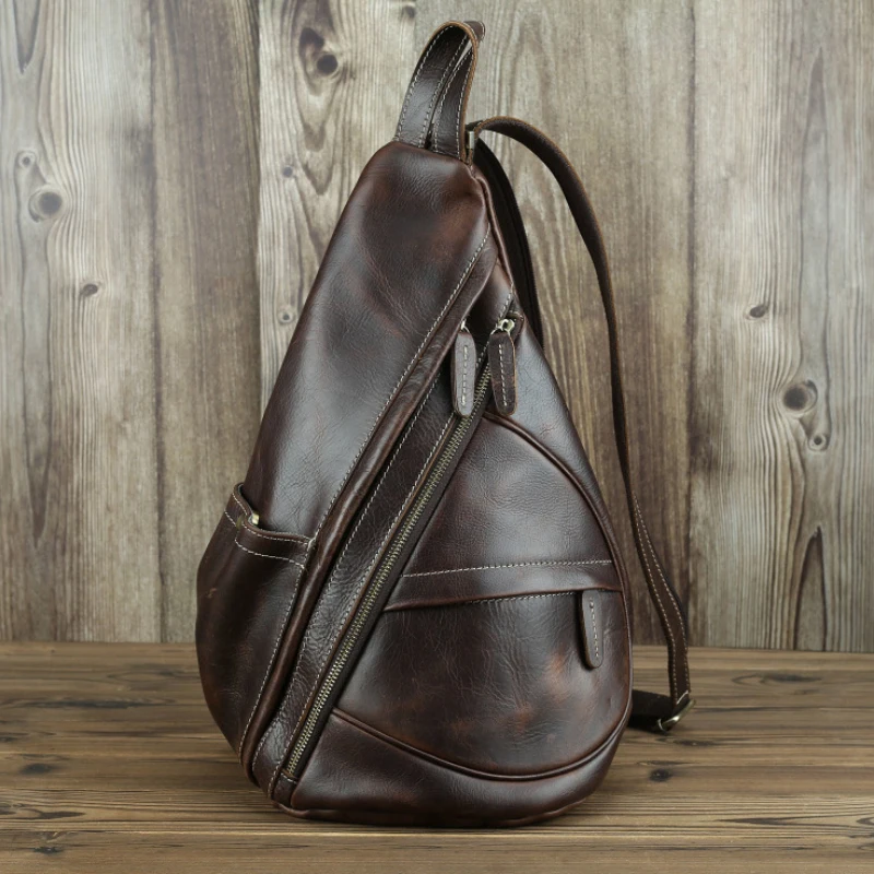 Hot Sale Unique Casual Genuine Leather Triangle Backpack Male Female Travlling Bagpack For Ipad Small Backpack Portable Men Bag