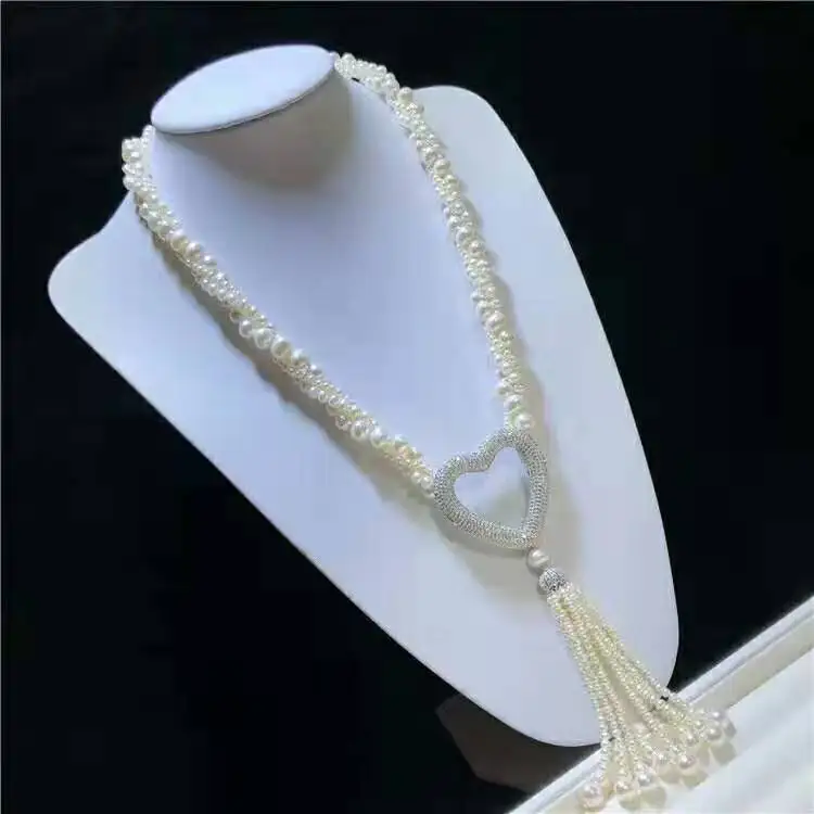 

Hand knotted white distorted natural freshwater pearl peach heart micro inlay zircon tassel sweater chain necklace 74-76cm