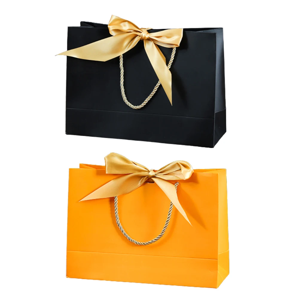 

Colored Kraft Paper Bags With Handles Rectangular Shopping Bags Gift Candy Favor Bag With Bow Ribbon Party Birthday Supplies 1pc