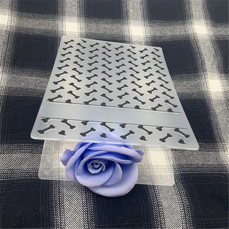 Embossing plastic folding making Dog eating bone greeting card background Used for DIY scrapbook folder embossing mold