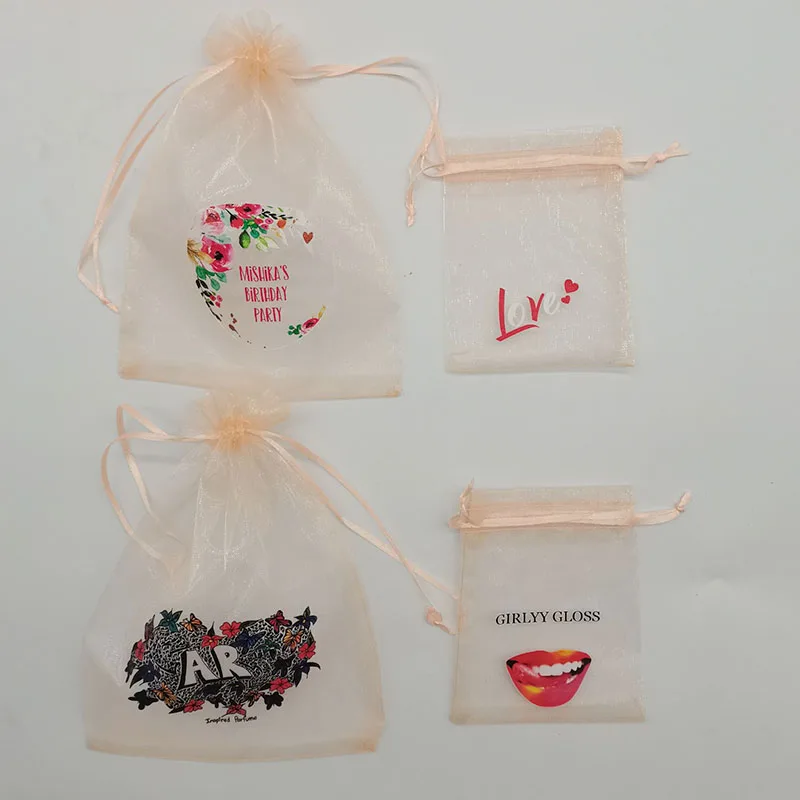 100pcs 사용자 정의 로고 샴페인 컬러 인쇄 Drawstring Organza 선물 가방 작은 주머니 보석 포장 메이크업 가방