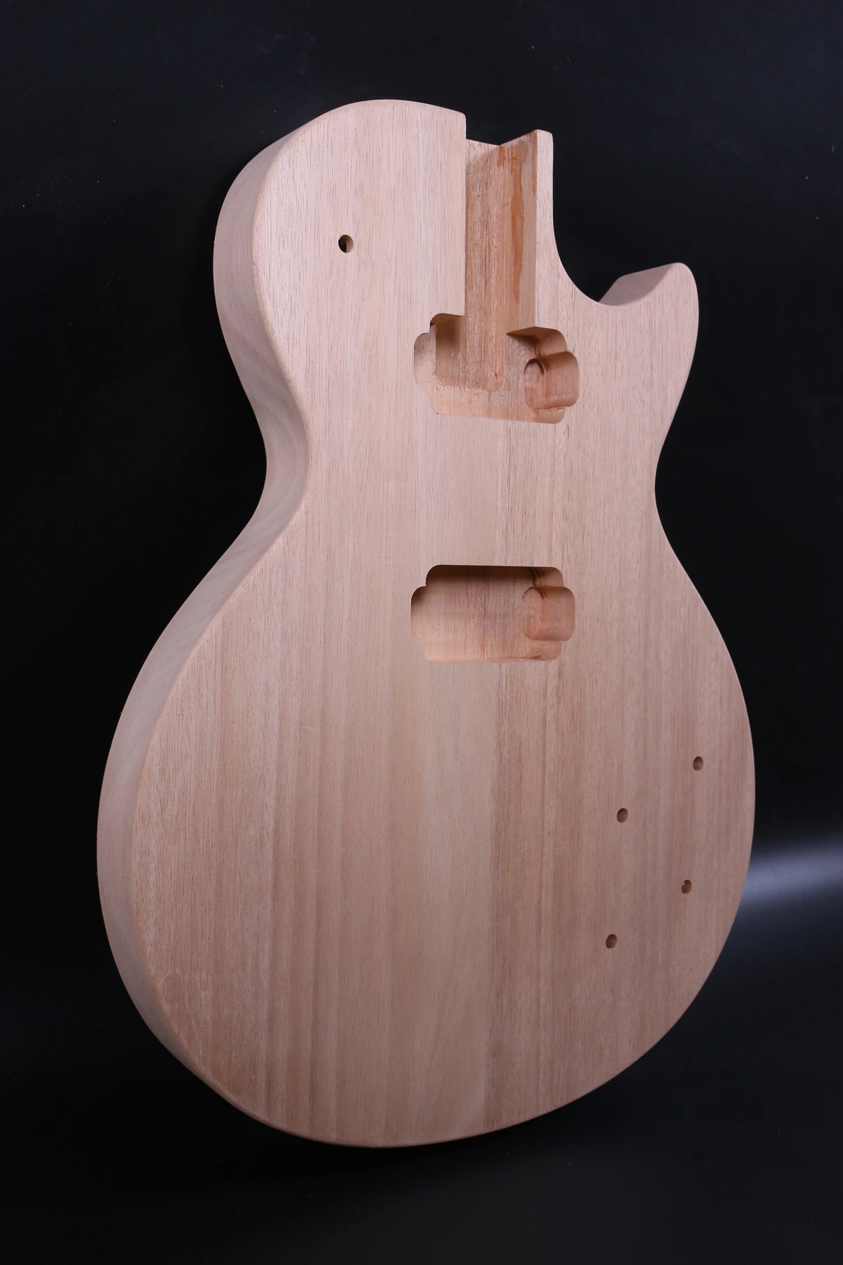 one right hand unfinished electric guitar  body    mahogany made  and maple top high quality